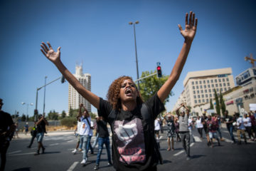 Ethiopians and supporters demonstrate against police violence and discrimination following the death of 19-year-old Ethiopian, Solomon Tekah.
