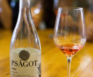 A bottle and glass of wine in the Psagot winery in Judea and Samaria