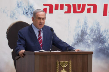 Israeli Prime Minister Benjamin Netanyahu attends a ceremony marking the 10th anniversary since the Second Lebanon War at the Mount Herzl military cemetery in Jerusalem