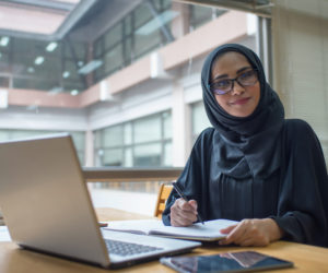 Saudi woman at computer