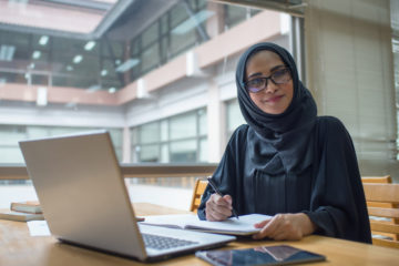 Saudi woman at computer
