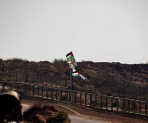 Palestinian and swastika symbols next to the Israel-Gaza border