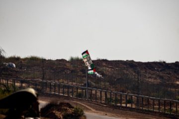 Palestinian and swastika symbols next to the Israel-Gaza border
