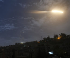 Missiles flying into the sky near international airport, in Damascus, Syria, Monday, Jan. 21, 2019. In a very unusual move, the Israeli military issued a statement saying it iwas attacking Iranian military targets in Syria.