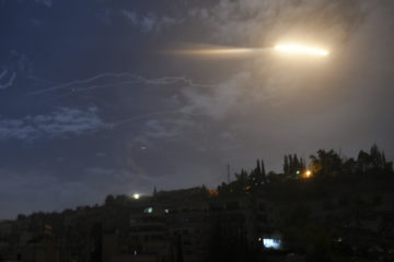 Missiles flying into the sky near international airport, in Damascus, Syria, Monday, Jan. 21, 2019. In a very unusual move, the Israeli military issued a statement saying it iwas attacking Iranian military targets in Syria.