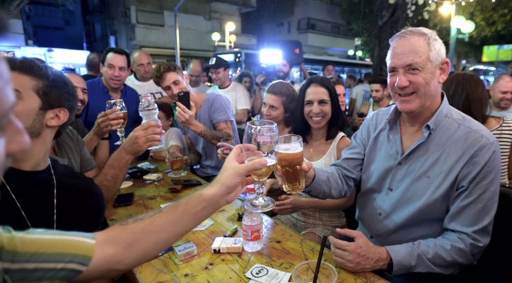 Netanyahu slips as Benny Gantz takes lead in latest poll with one week to go