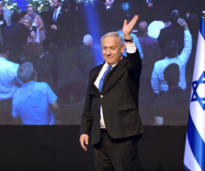 Israeli Prime Minister Benjamin Netanyahu, head of the Likud Party, carries a speach after the release of first voting results in the Israeli general elections