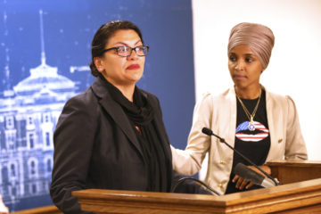 Rep. Ilhan Omar, right, (D-Minn) and Rep. Rashida Tlaib (D-MI)