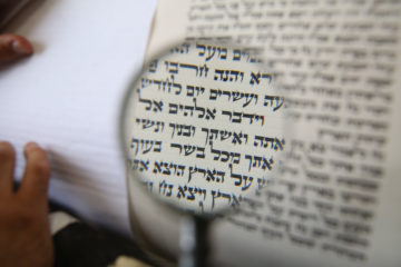 Nadav Elhadad, a writer at the Mount Sinai Institute writes a Sefer Torah (Torah Scroll) in the Northern Israeli city of Tzfat, June 13, 2019.