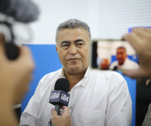 Labor-Gesher party leader Amir Peretz speaks with the media after casting his ballot at a voting station in Sderot, during the Knesset Elections, on September 17, 2019.