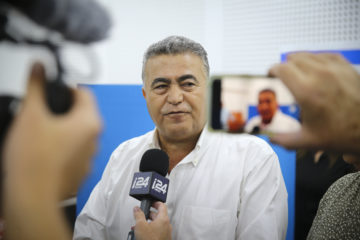 Labor-Gesher party leader Amir Peretz speaks with the media after casting his ballot at a voting station in Sderot, during the Knesset Elections, on September 17, 2019.