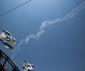 View of the trail left in the sky by a Patriot missiles that was fired to intercept a Syrian jet entering Israel from Syria, as seen in the Northern Israeli city of Tzfat, on July 24, 2018.