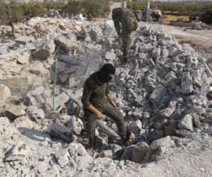 Rubble from destroyed houses near the village of Barisha, in Idlib province, Syria, Oct. 27, 2019, after an operation by the U.S. military which targeted Abu Bakr al-Baghdadi.