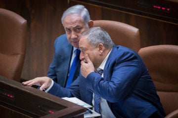 Prime Minister Benjamin Netanyahu and then-Defense Minister Avigdor Liberman in the Knesset, on October 24, 2017.