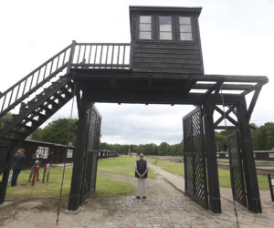 In this July 18, 2017 file photo, the wooden main gate leading into the former Nazi German Stutthof concentration camp is photographed, in Sztutowo, Poland.