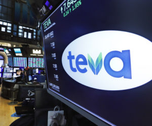 The logo for Teva appears above a trading post on the floor of the New York Stock Exchange, Monday, Oct. 21, 2019.