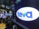The logo for Teva appears above a trading post on the floor of the New York Stock Exchange, Monday, Oct. 21, 2019.