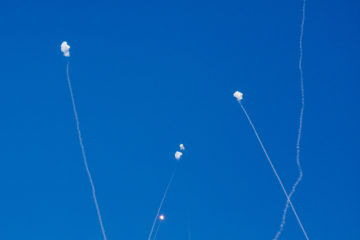 Smoke trails are seen as rockets launched from the Gaza Strip are intercepted by the Israeli Iron Dome on May 5, 2019.