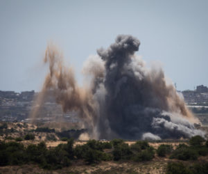 Smoke rises following an Israeli attack on Gaza Strip.