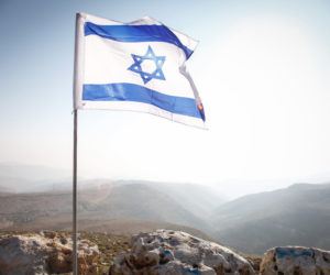 The Israeli flag in the Jordan Valley near one of the Israeli communities there.