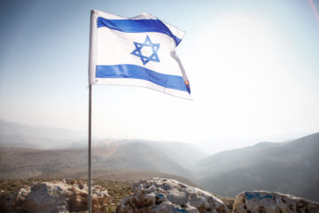 The Israeli flag in the Jordan Valley near one of the Israeli communities there.