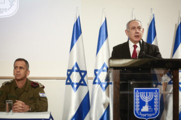 Prime Minister Benjamin Netanyahu, right, and IDF Chief of Staff Aviv Kochavi deliver a statement to the press, at defense headquarters in Tel Aviv, on November 12, 2019.