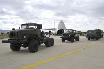 Military vehicles and equipment, parts of the S-400 air defense systems, are seen on the tarmac, after they were unloaded from a Russian transport aircraft, at Murted military airport in Ankara, Turkey, Friday, July 12, 2019.