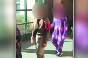 A student at the Creekside Elementary School in Kaysville, Utah, marches in a school Halloween parade dressed as Hitler.
