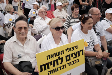 Holocaust survivors attend a rally in Tel Aviv to raise awareness of their difficult financial plight.
