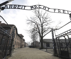 The Nazi death camp Auschwitz-Birkenau in Oswiecim, Poland. The sign over the gate reads "work makes one free."