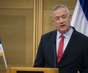 Blue and White chairman Benny Gantz speaks during a faction meeting at the Knesset, the Israeli parliament in Jerusalem, on December 9, 2019.