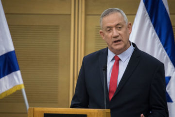 Blue and White chairman Benny Gantz speaks during a faction meeting at the Knesset, the Israeli parliament in Jerusalem, on December 9, 2019.