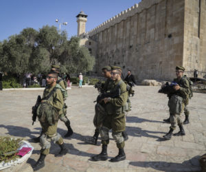Israeli soldeirs seen patroling outside the Cave of the Patriarchs in Hevron, on August 30, 2019.