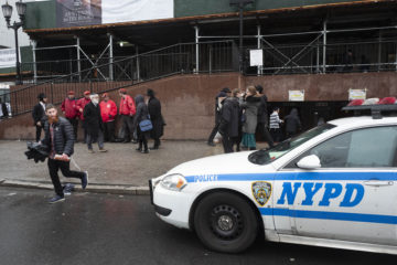 Police and members of the Guardian Angels volunteer safety patrol organization, in front of the Chabad Lubavitch World Headquarters, Monday, Dec. 30, 2019 in the Brooklyn borough of New York.