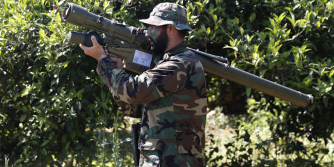 Hezbollah fighter holding an Iranian-made anti-aircraft missile on the border with Israel, in Naqoura, south Lebanon.