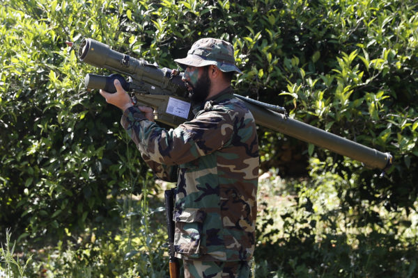 Hezbollah fighter holding an Iranian-made anti-aircraft missile on the border with Israel, in Naqoura, south Lebanon.