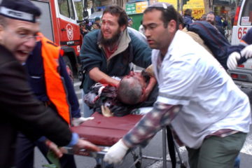 Medics rush a man wounded