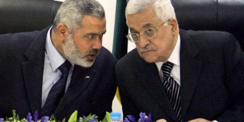PA head Mahmoud Abbas, right, and Hamas leader Islamil Haniyeh