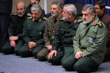 Gen. Amir Ali Hajizadeh, the head of the Islamic Revolutionary Guard's aerospace division, right, attends a mourning ceremony for Gen. Qassem Soleimani a day after a Ukrainian plane crash, in Tehran, Iran.