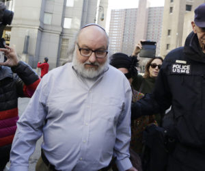 Convicted spy Jonathan Pollard leaves a federal courthouse in New York Friday, Nov. 20, 2015.