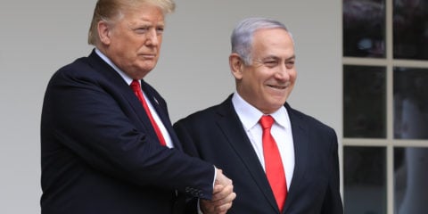 In this March 25, 2019 photo, President Donald Trump welcomes visiting Israeli Prime Minister Benjamin Netanyahu to the White House in Washington.