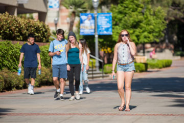 UCLA students walking on Bruin Walk.