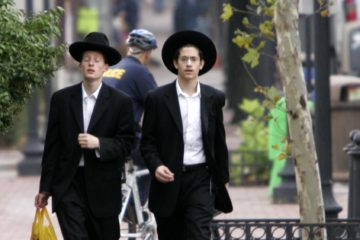 Two young men in Orthodox Jewish garb