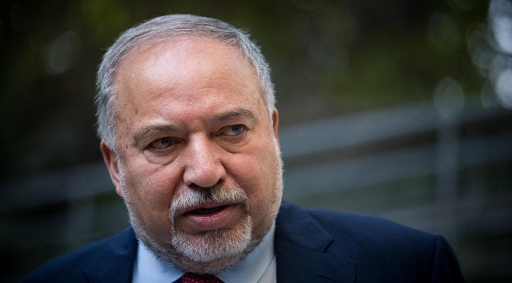 Liberman accused of trying to have officer assassinated, files criminal complaint