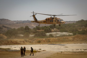 Israeli soldiers participate in an exercise simulating evacuation of wounded Israeli soldiers by helicopter.