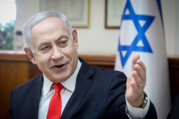 Israeli Prime Minister Benjamin Netanyahu leads the weekly cabinet meeting, at the Prime Minister's office in Jerusalem.