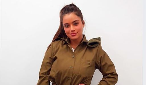 Israeli pop star puts career on hold to join IDF