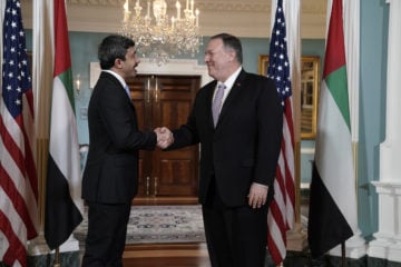 Foreign Minister Abdullah bin Zayed bin Sultan Al Nahyan of the United Arab Emirates, left, is welcomed by Secretary of State Mike Pompeo