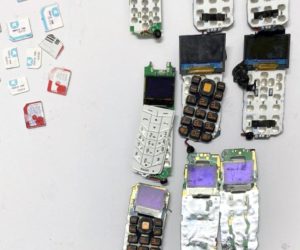 Smuggled cellphones extricated from detainee's lower abdomen.