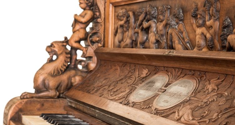 Piano said to be made of wood from Holy Temple up for auction